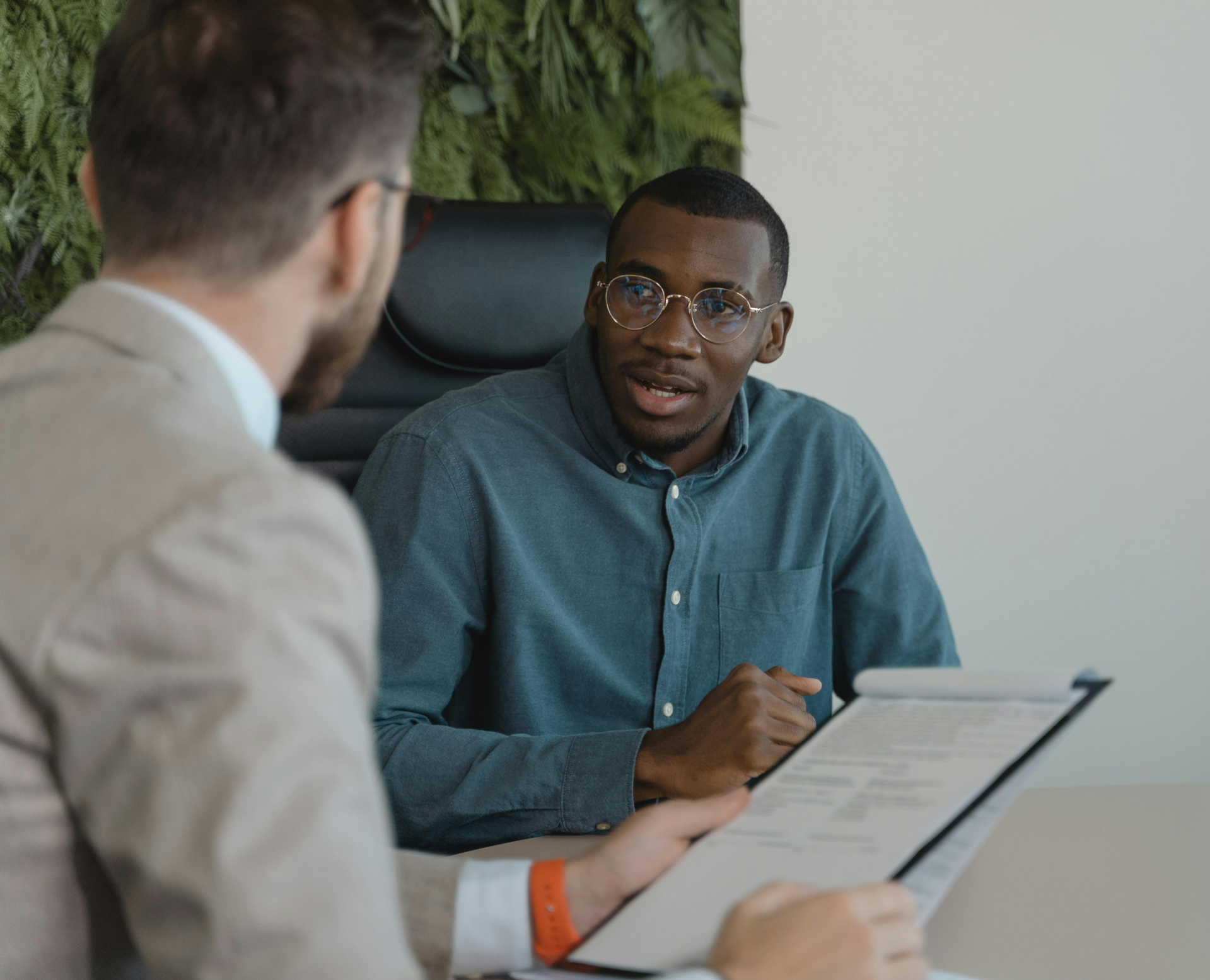 pre-law student interviewing with a law school admissions department head
