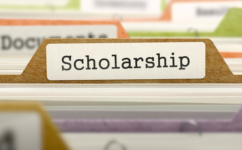 File folders with one labeled "Scholarship"